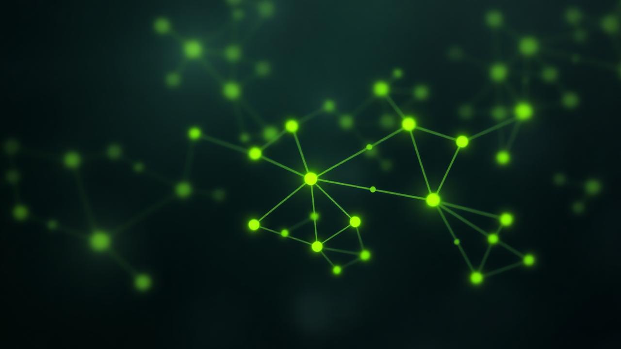 Abstract network of glowing nodes branching across a dark surface